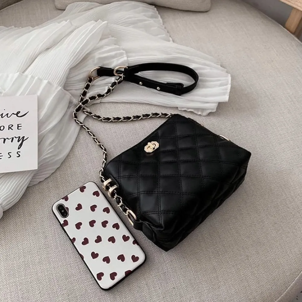 Black PU leather crossbody bag close-up