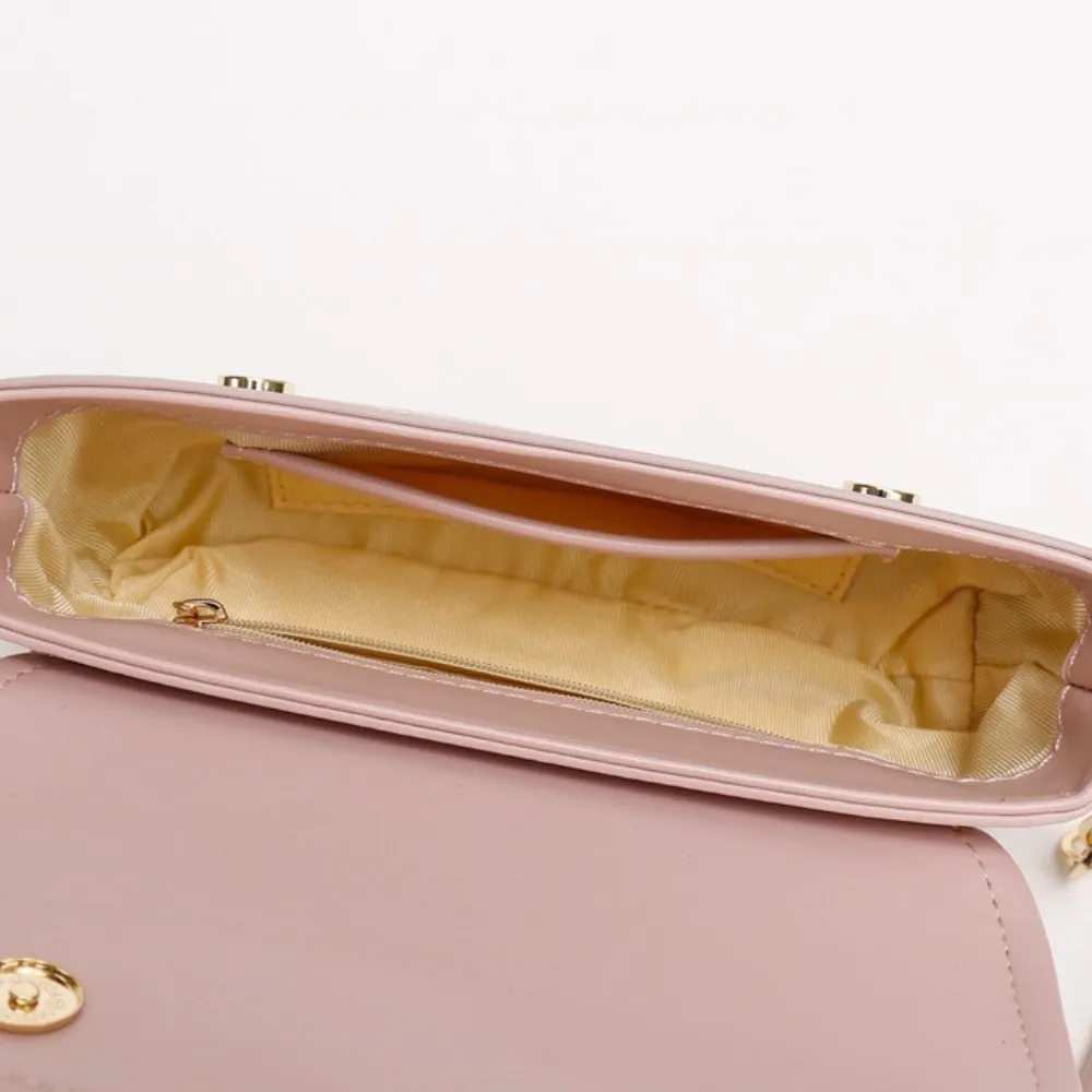 Pink crossbody bag interior and storage space