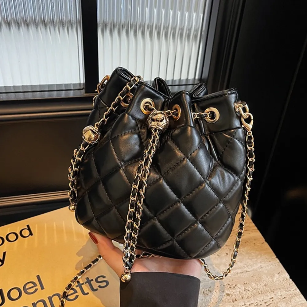 Black textured crossbody bag with chain strap