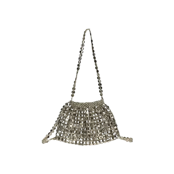 Silver crystal crossbody bag worn by a woman
