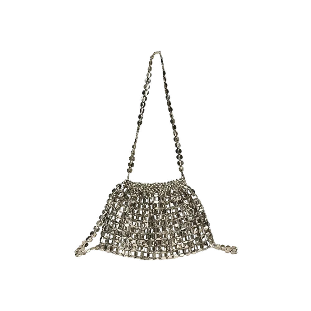 Silver crystal crossbody bag worn by a woman