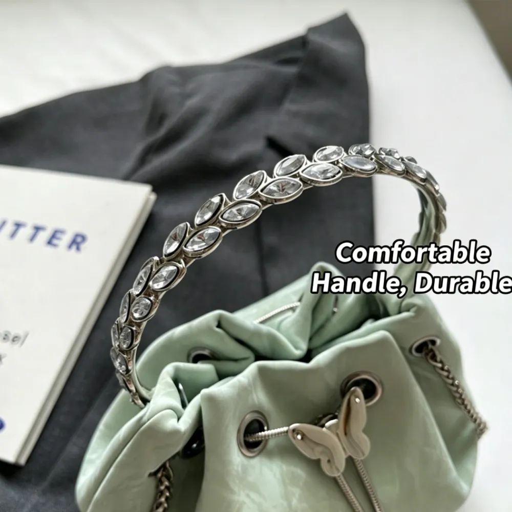 Mint green crossbody bag with decorative chain handle