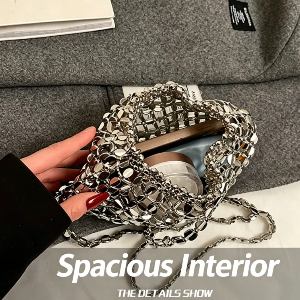 Silver acrylic crossbody bag with spacious interior