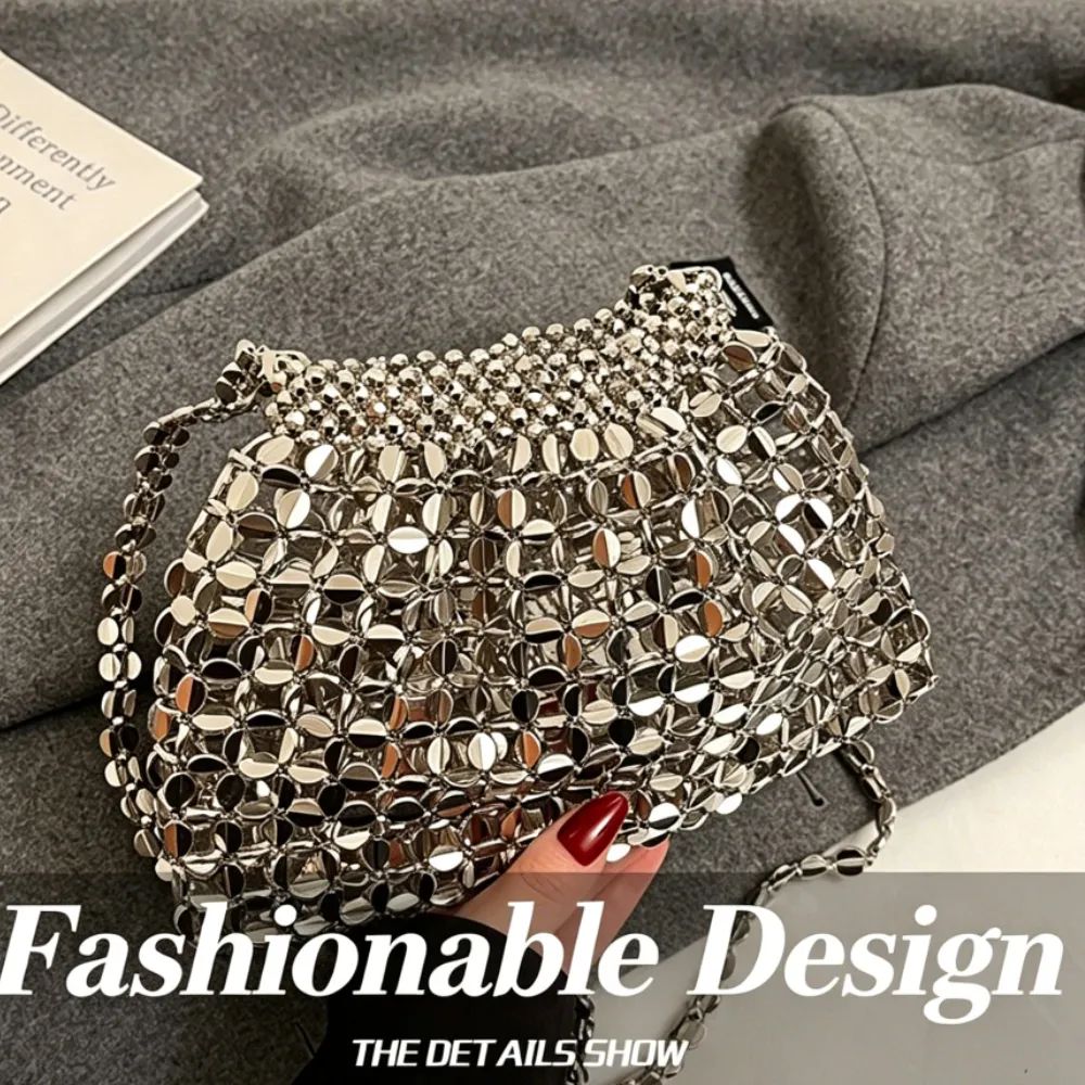 Silver acrylic crossbody bag with fashionable textured design
