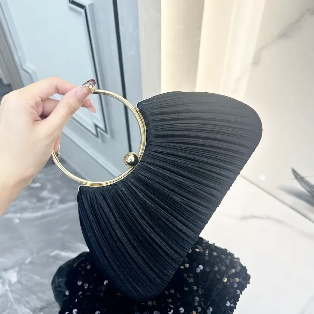 Black pleated ring handle handbag