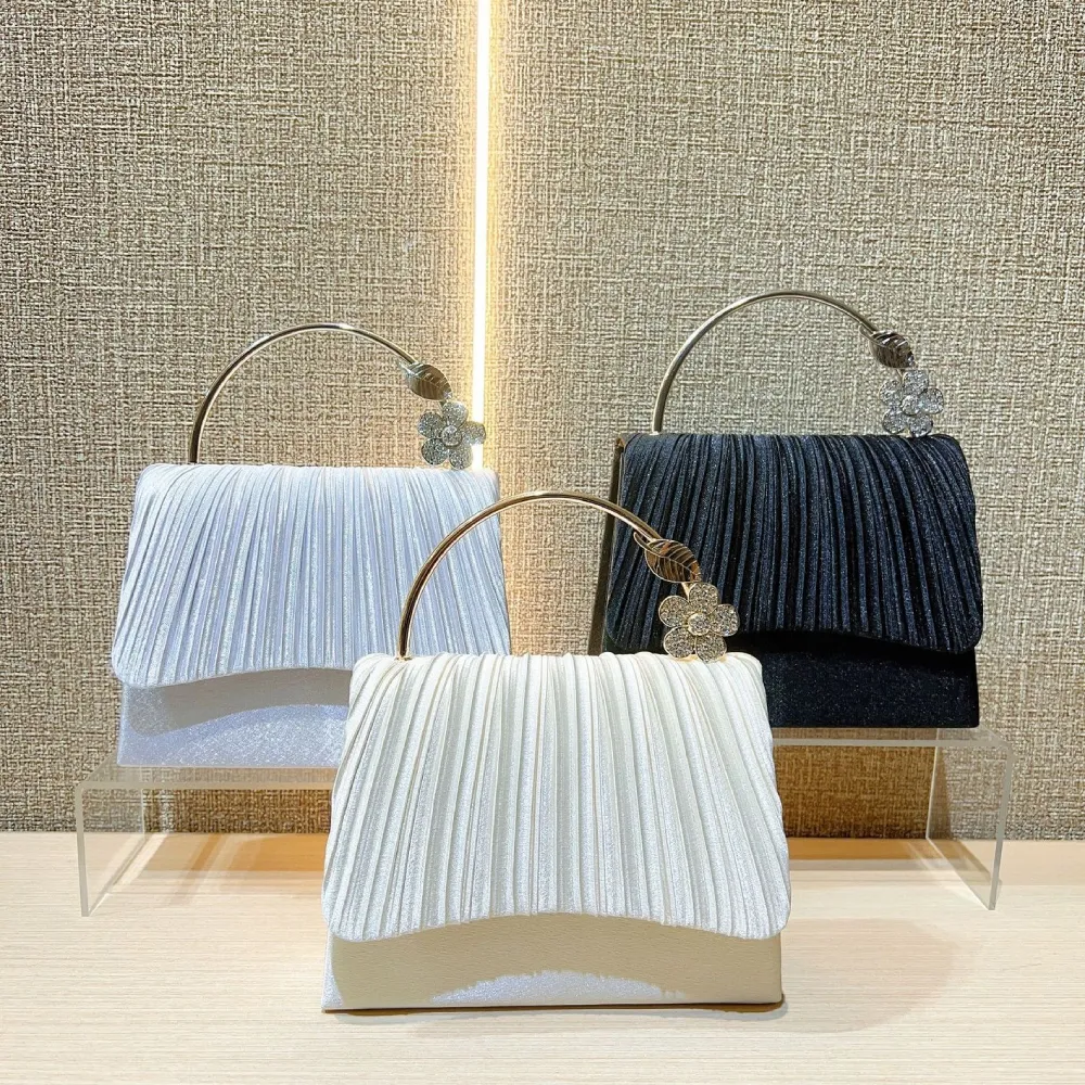 Crodar handle handbags in black white and beige