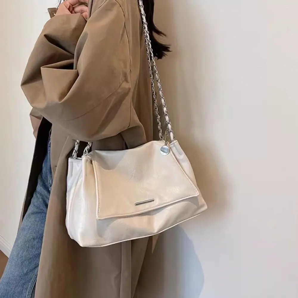 white leather bag