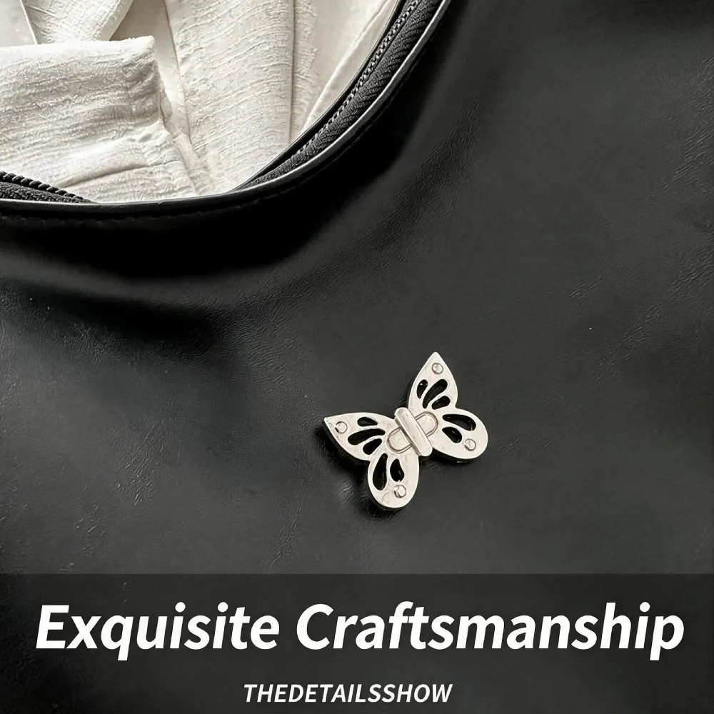 elegant butterfly metal decoration on women's leather handbag
