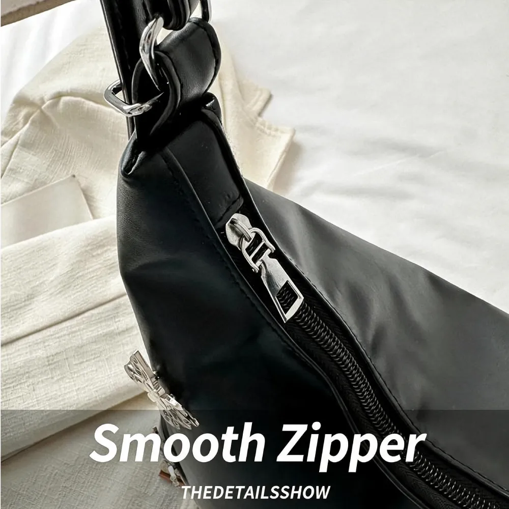 smooth zipper detail on women's leather shoulder bag