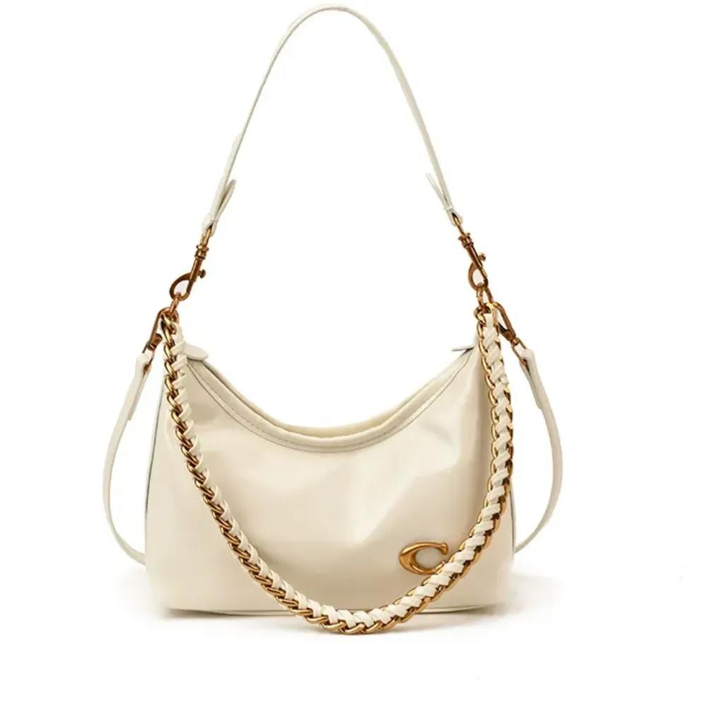 White leather shoulder bag with curved design