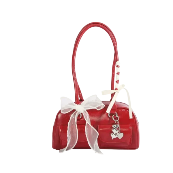 Red bow shoulder bag with heart-shaped charm