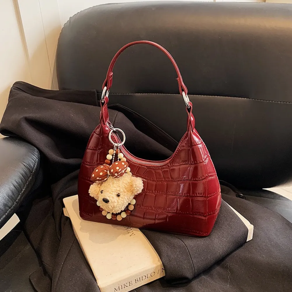 Burgundy vintage handbag for women with teddy bear charm