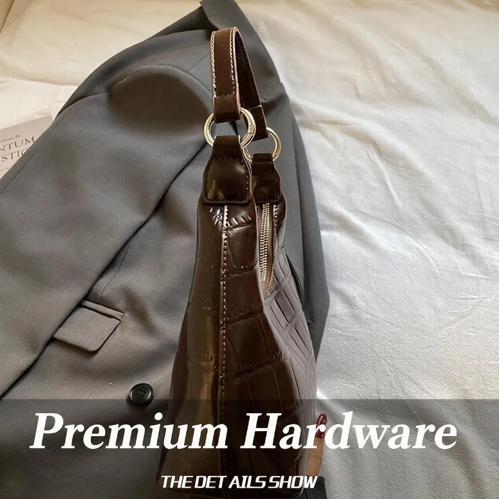 Brown handbag with premium hardware details