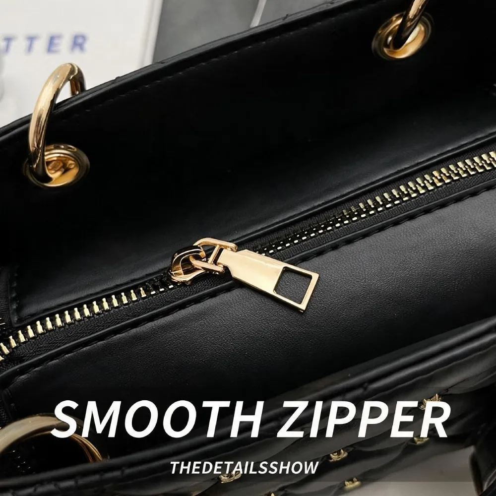 Black women handbag with smooth gold-tone zipper closure
